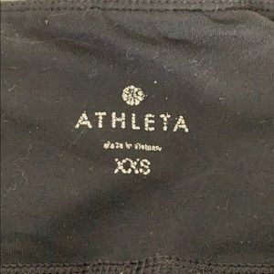 Cropped Athleta leggings with zippers on both side